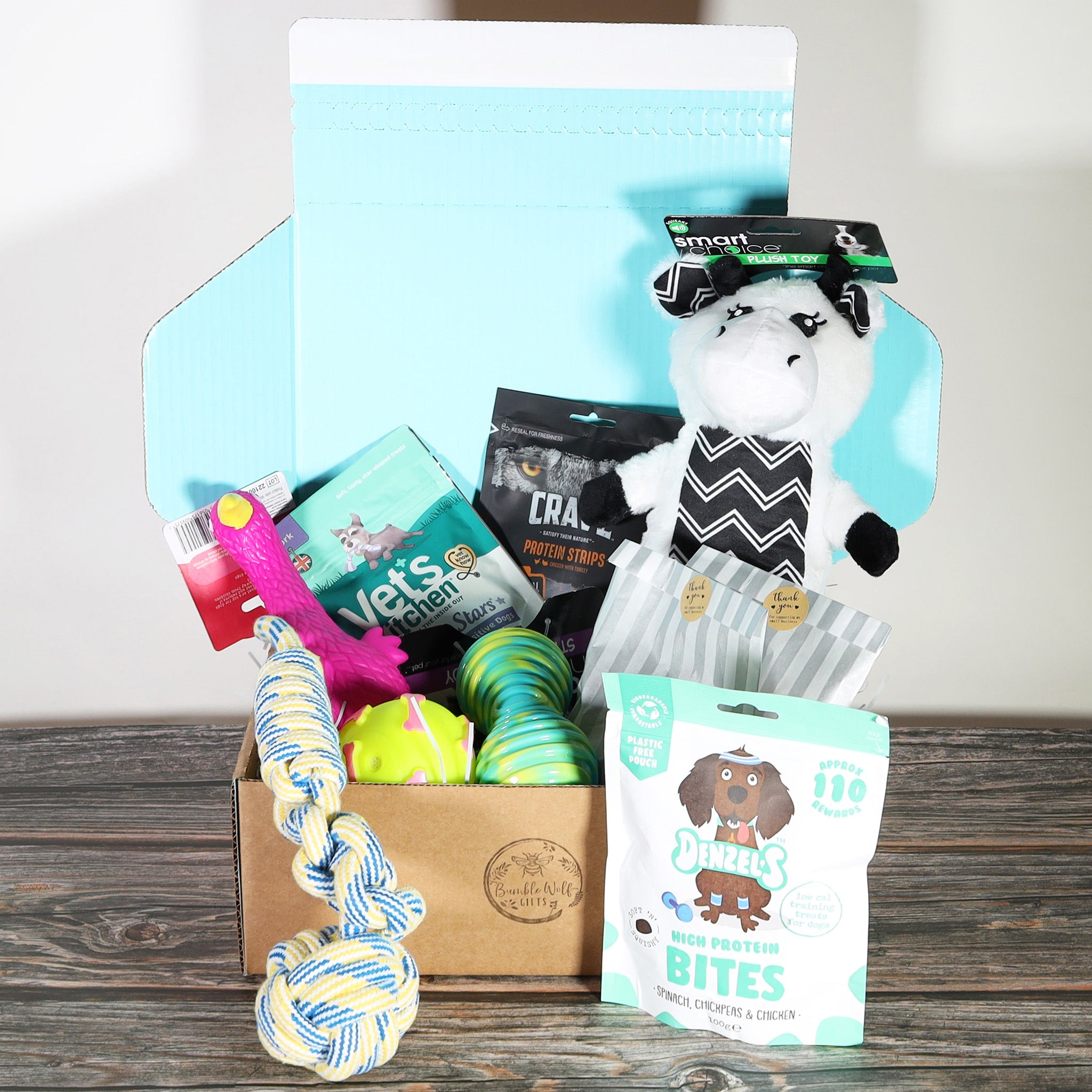 Gift Box for Dogs! Every Brindle Box is customized and full of yummy retailer treats, cute dog toys and essential pet goodies.